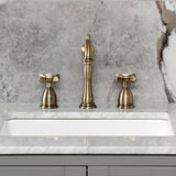 Essex Two-Handle 3-Hole Deck Mount Widespread Bathroom Faucet with Brass Pop-Up