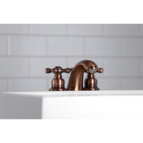 Victorian Two-Handle 3-Hole Deck Mount Mini-Widespread Bathroom Faucet with Pop-Up Drain