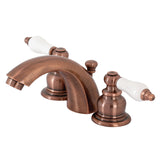 Victorian Two-Handle 3-Hole Deck Mount Mini-Widespread Bathroom Faucet with Pop-Up Drain