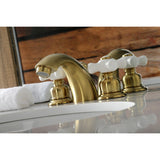 Victorian Two-Handle 3-Hole Deck Mount Mini-Widespread Bathroom Faucet with Plastic Pop-Up