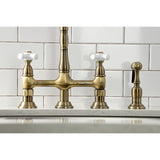 Heritage Two-Handle 4-Hole Deck Mount Bridge Kitchen Faucet with Brass Sprayer