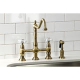 Heritage Two-Handle 4-Hole Deck Mount Bridge Kitchen Faucet with Brass Sprayer