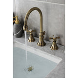 Essex Two-Handle 3-Hole Deck Mount Widespread Bathroom Faucet with Brass Pop-Up
