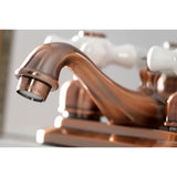 Restoration Two-Handle 3-Hole Deck Mount 4" Centerset Bathroom Faucet with Plastic Pop-Up