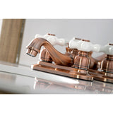 Restoration Two-Handle 3-Hole Deck Mount 4" Centerset Bathroom Faucet with Plastic Pop-Up