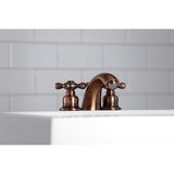 Victorian Two-Handle 3-Hole Deck Mount Mini-Widespread Bathroom Faucet with Plastic Pop-Up