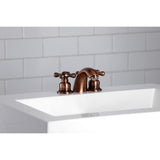 Victorian Two-Handle 3-Hole Deck Mount Mini-Widespread Bathroom Faucet with Plastic Pop-Up