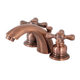 Victorian Two-Handle 3-Hole Deck Mount Mini-Widespread Bathroom Faucet with Plastic Pop-Up