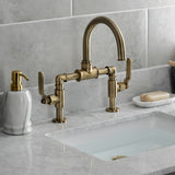 Whitaker Two-Handle 2-Hole Deck Mount Bridge Bathroom Faucet with Pop-Up Drain