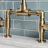 Webb Two-Handle 2-Hole Deck Mount Bridge Bathroom Faucet with Knurled Handle and Push Pop-Up Drain