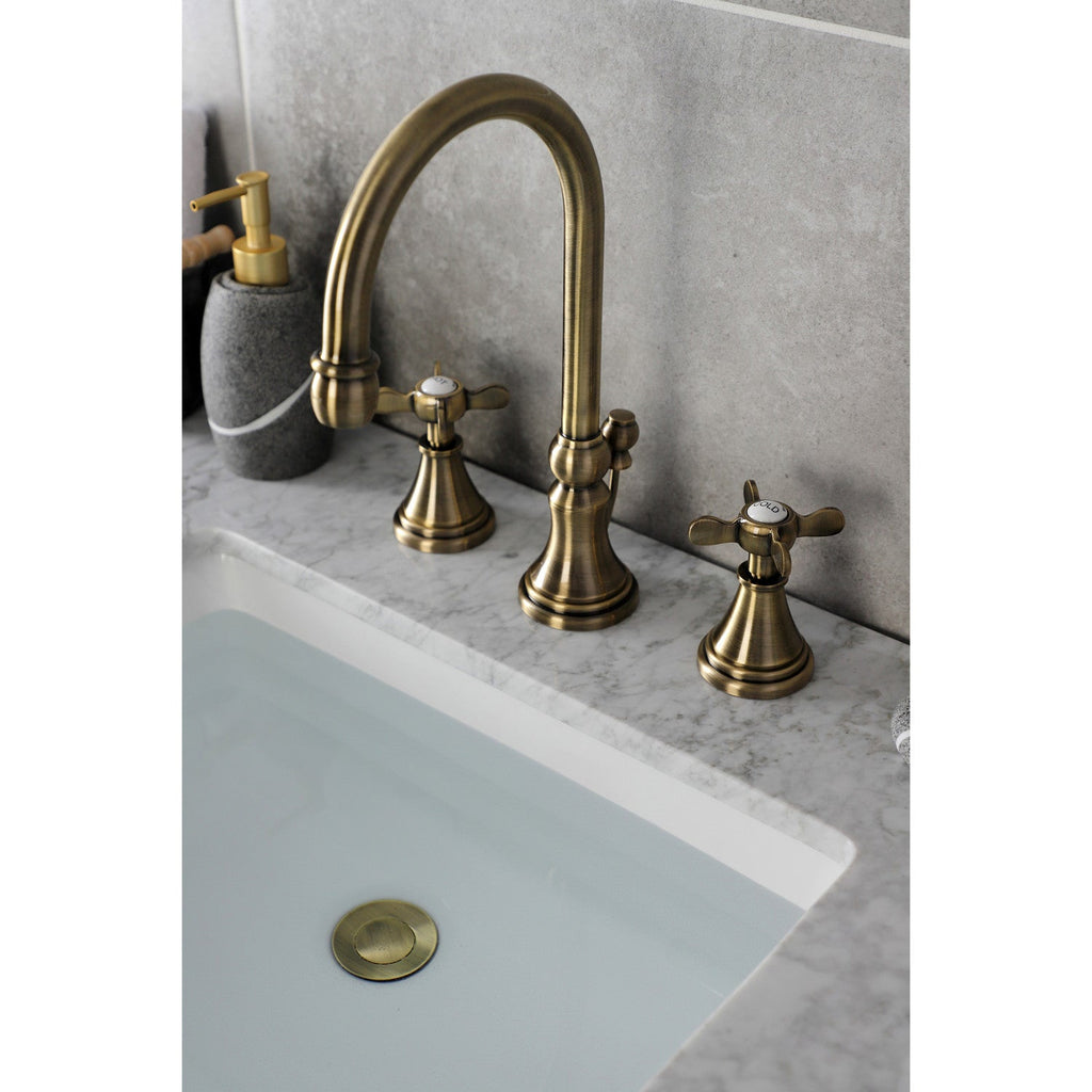 Essex Two-Handle 3-Hole Deck Mount Widespread Bathroom Faucet with Brass Pop-Up