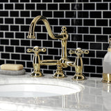 Restoration Two-Handle 3-Hole Deck Mount Bridge Bathroom Faucet with Brass Pop-Up