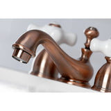 Restoration Two-Handle 3-Hole Deck Mount Mini-Widespread Bathroom Faucet with Brass Pop-Up